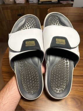 Jordan White and Black Slide Sandals with Gold Accent